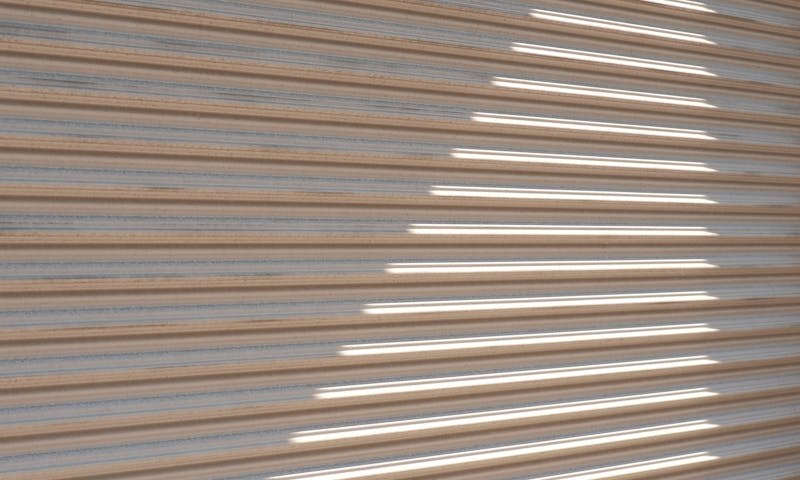 Dépannage rideau métallique commerce bloqué - urgence 24/7 Bruxelles - BruxellesVolets